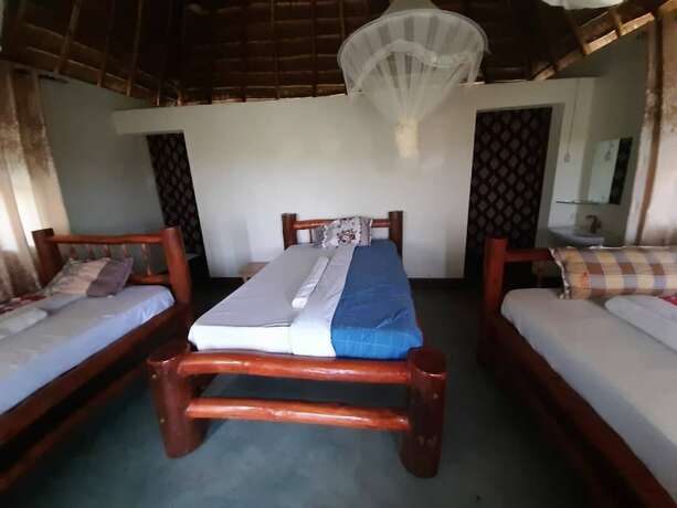 Imagen de la habitación del Hotel Tangi Safaris Lodge. Foto 26