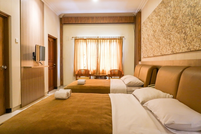 Imagen de la habitación del Hotel Tangko Inn Resort, Sindanglaya. Foto 2