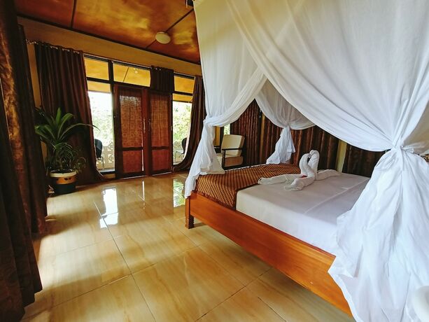 Imagen de la habitación del Hotel Tangkoko Sanctuary Villa and Spa. Foto 23