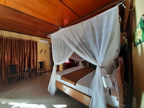 Imagen de la habitación del Hotel Tangkoko Sanctuary Villa and Spa. Foto 27