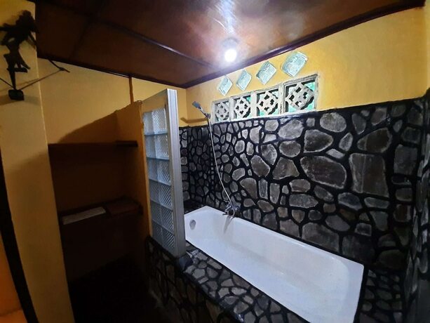 Imagen de la habitación del Hotel Tangkoko Sanctuary Villa and Spa. Foto 31