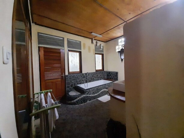 Imagen de la habitación del Hotel Tangkoko Sanctuary Villa and Spa. Foto 33