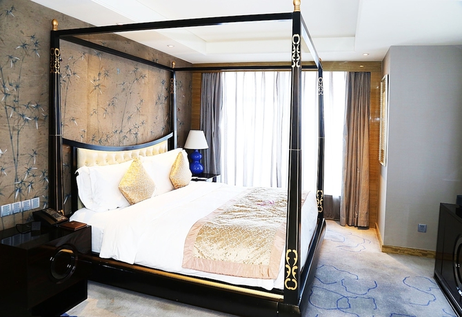 Imagen de la habitación del Hotel Tangla Tianjin. Foto 3