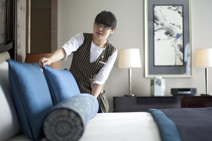 Imagen de la habitación del Hotel Tangla Tianjin. Foto 5