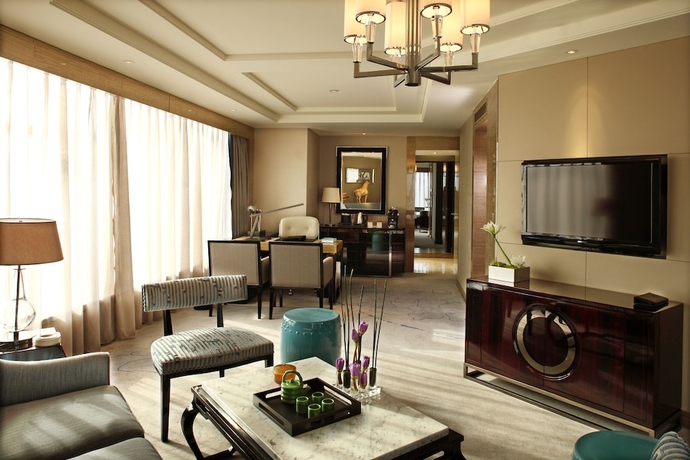 Imagen de la habitación del Hotel Tangla Tianjin. Foto 6