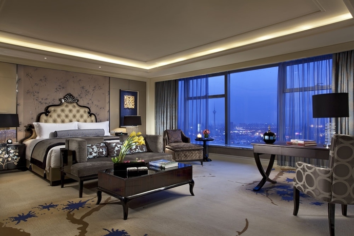 Imagen de la habitación del Hotel Tangla Tianjin. Foto 8