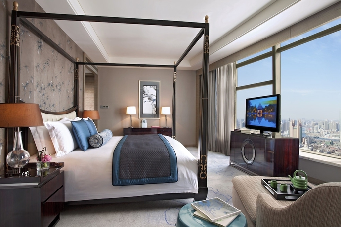 Imagen de la habitación del Hotel Tangla Tianjin. Foto 12