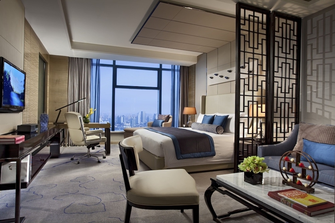 Imagen de la habitación del Hotel Tangla Tianjin. Foto 13