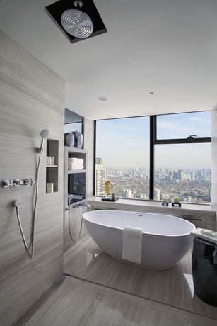 Imagen de la habitación del Hotel Tangla Tianjin. Foto 14