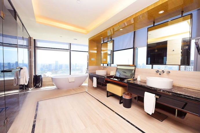 Imagen de la habitación del Hotel Tangla Tianjin. Foto 15