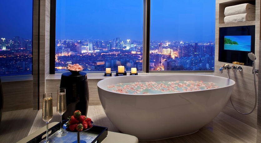 Imagen de la habitación del Hotel Tangla Tianjin. Foto 16