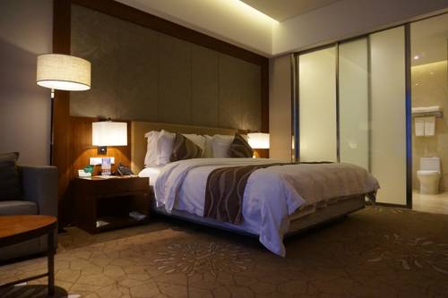 Imagen de la habitación del Hotel Tangram Harbin International Exhibition Cent. Foto 2