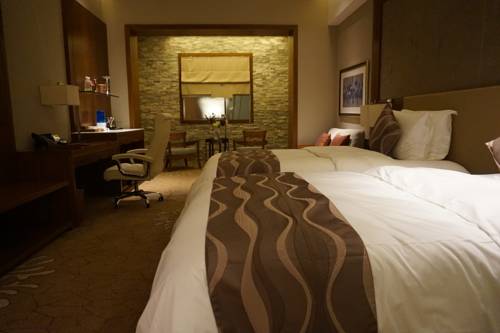 Imagen de la habitación del Hotel Tangram Harbin International Exhibition Cent. Foto 4