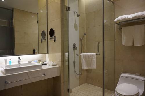 Imagen de la habitación del Hotel Tangram Harbin International Exhibition Cent. Foto 5