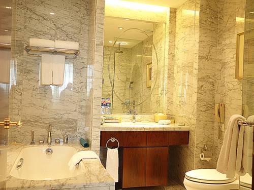 Imagen de la habitación del Hotel Tangshan Jinjiang International. Foto 7