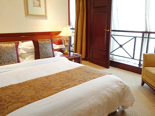 Imagen de la habitación del Hotel Tangshan Jinjiang International. Foto 8