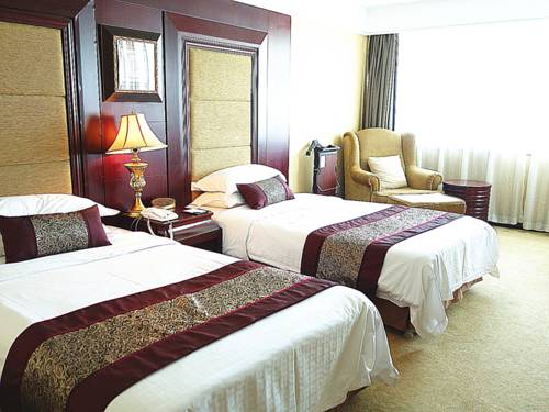 Imagen de la habitación del Hotel Tangshan Jinjiang International. Foto 9