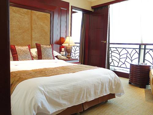 Imagen de la habitación del Hotel Tangshan Jinjiang International. Foto 10