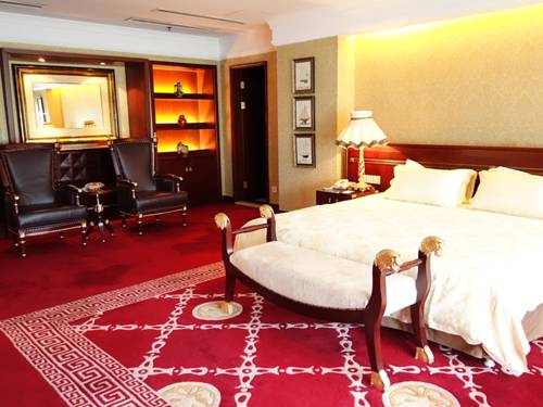 Imagen de la habitación del Hotel Tangshan Jinjiang International. Foto 12