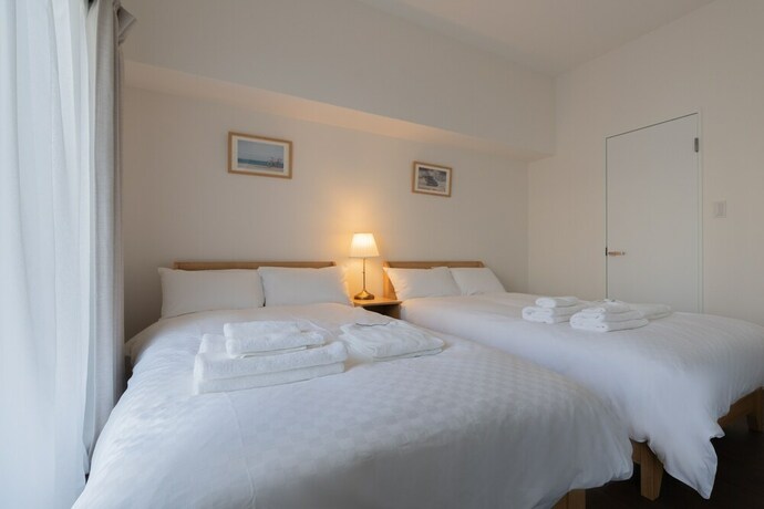 Imagen de la habitación del Hotel Tanimachikun We Namba. Foto 21