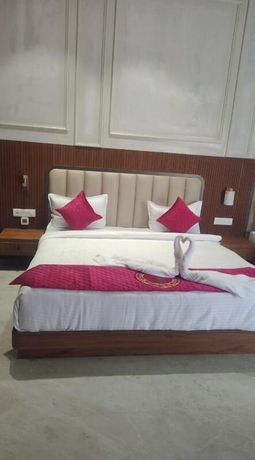 Imagen de la habitación del Hotel Tanishka INN. Foto 10