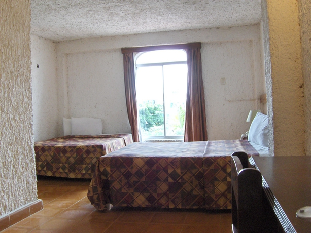 Imagen de la habitación del Hotel Tankah. Foto 6