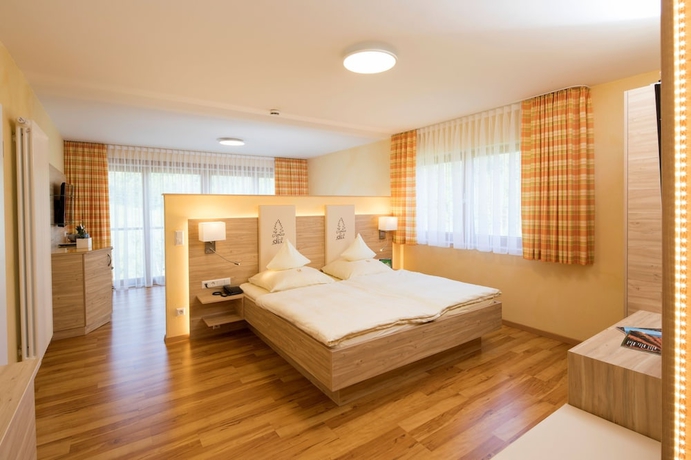 Imagen de la habitación del Hotel Tanne Tonbach - Wellness and Wohlf&uuml;hl. Foto 10
