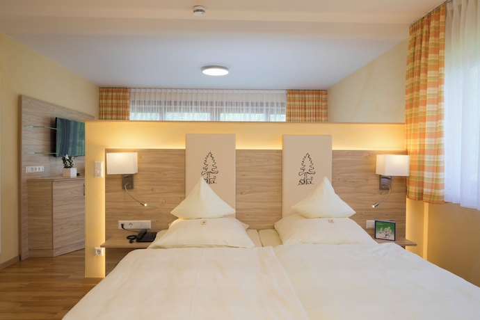 Imagen de la habitación del Hotel Tanne Tonbach - Wellness and Wohlf&uuml;hl. Foto 11