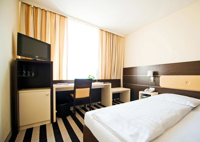Imagen de la habitación del Hotel Tante ALMA Bristol. Foto 4
