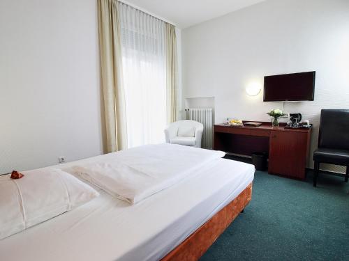 Imagen de la habitación del Hotel Tante Alma Mannheim. Foto 8