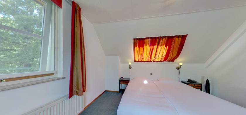 Imagen de la habitación del Hotel Tante Sien. Foto 13
