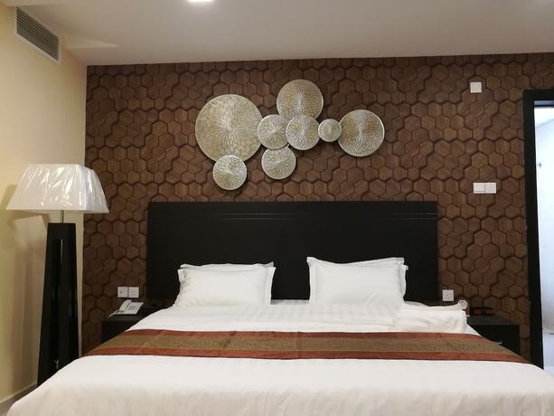 Imagen de la habitación del Hotel Tanuf Residency. Foto 5