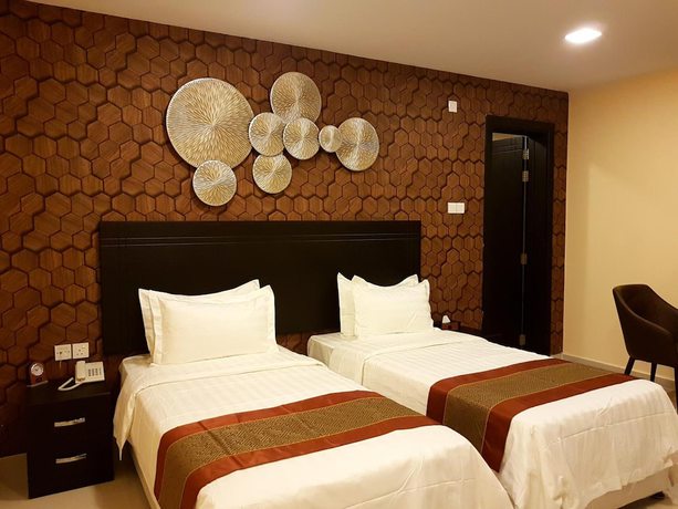 Imagen de la habitación del Hotel Tanuf Residency. Foto 6