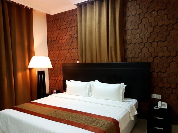 Imagen de la habitación del Hotel Tanuf Residency. Foto 10