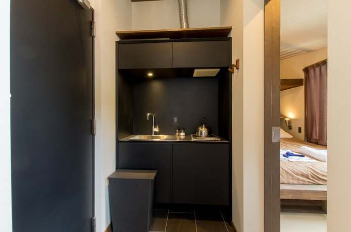 Imagen de la habitación del Hotel Tanuki Luxury Apartments. Foto 15