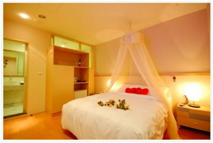 Imagen de los interiores del Hotel Tanxiang Resort Sun Moon Lake Harbour - Sun. Foto 24
