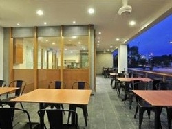 Imagen del bar/restaurante del Hotel Tan'yaa By Ri-yaz. Foto 2