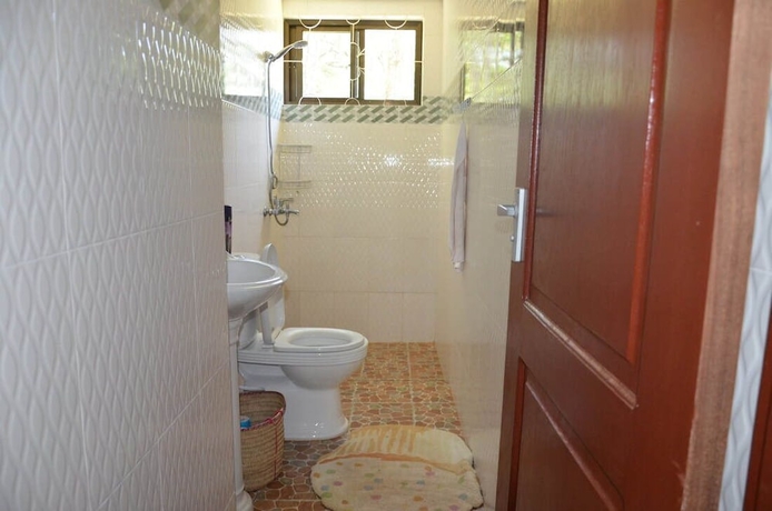 Imagen de la habitación del Hotel Tanzania Volunteers Hostel. Foto 9