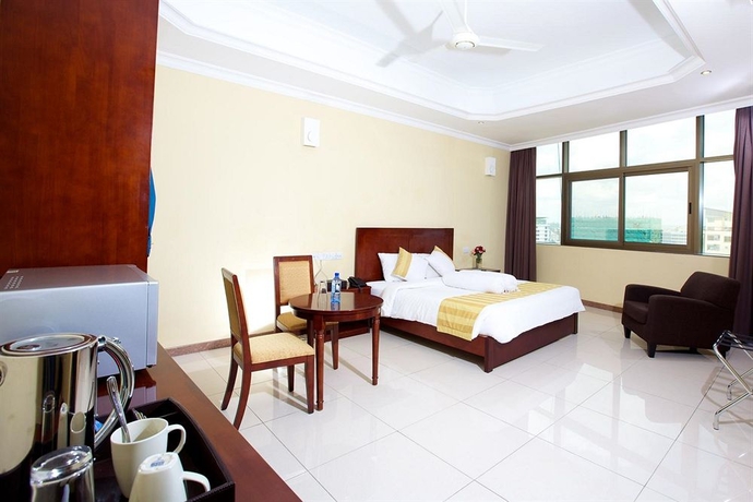 Imagen de la habitación del Hotel Tanzanite Executive Suites. Foto 6