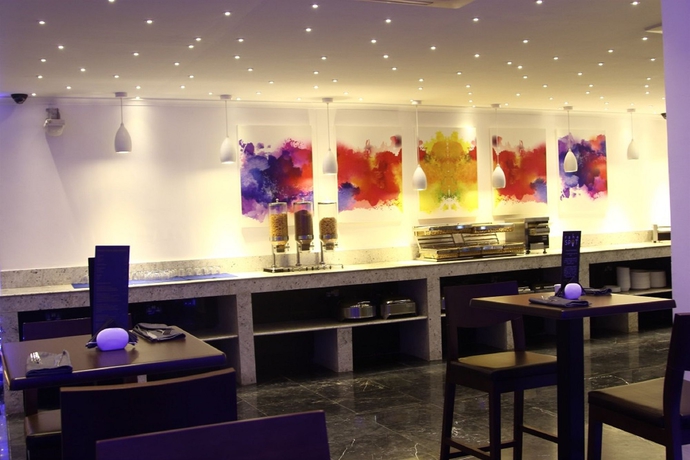 Imagen del bar/restaurante del Hotel Tanzanite Executive Suites. Foto 5