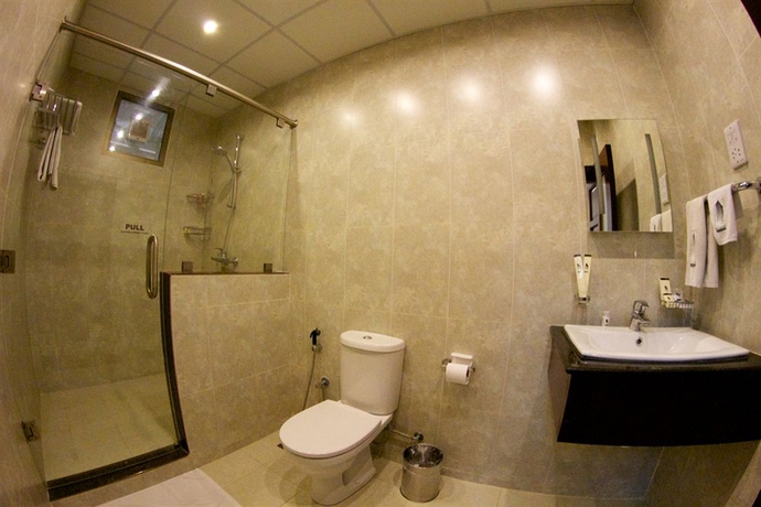 Imagen de la habitación del Hotel Tanzanite Executive Suites. Foto 9