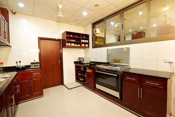 Imagen de la habitación del Hotel Tanzanite Executive Suites. Foto 10