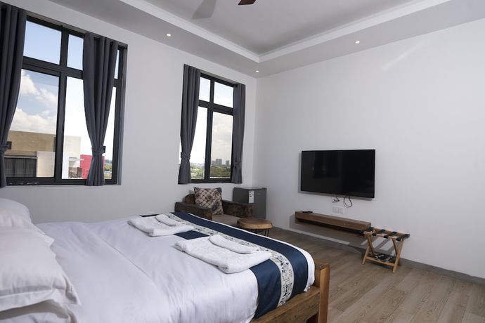 Imagen de la habitación del Hotel Tanzanite Serviced Apartment. Foto 12