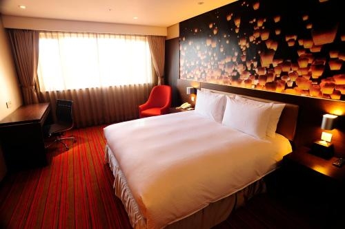 Imagen de la habitación del Hotel Tao Garden. Foto 6