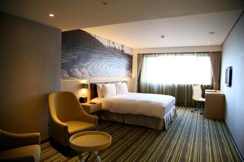 Imagen de la habitación del Hotel Tao Garden. Foto 7