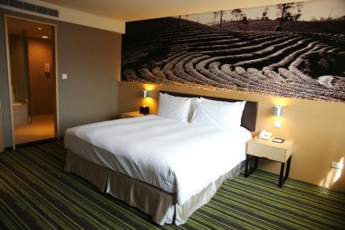 Imagen de la habitación del Hotel Tao Garden. Foto 8