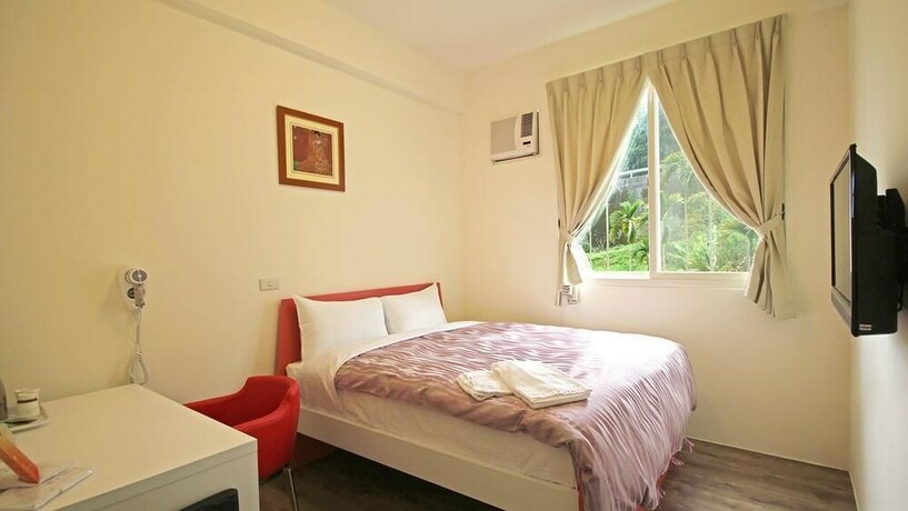 Imagen de la habitación del Hotel Taomi 5211 B&b. Foto 16