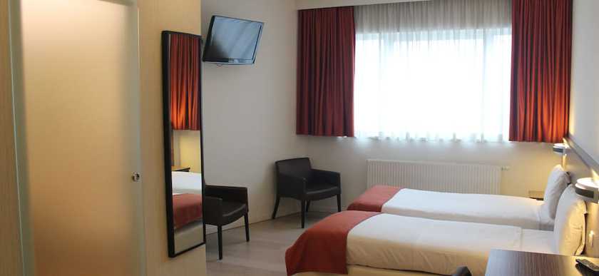 Imagen de la habitación del Hotel Taormina Brussels Airport. Foto 2
