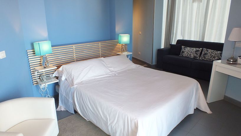 Imagen de la habitación del Hotel Taormina Palace. Foto 11