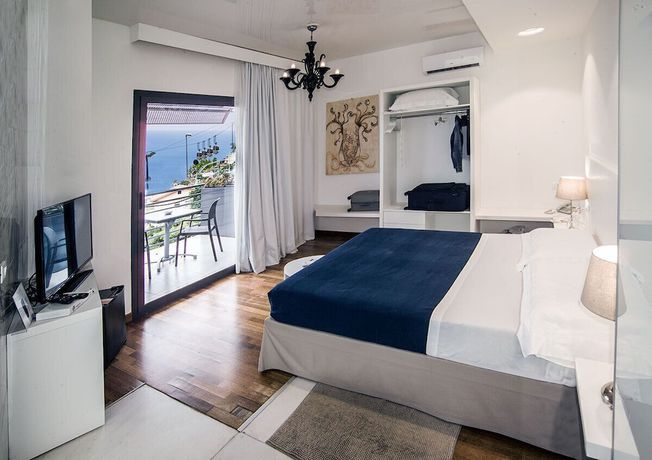 Imagen de la habitación del Hotel Taormina Palace. Foto 12